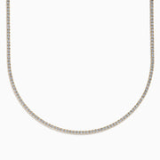 The Lab Grown Diamond 6.8ct Tennis Necklace in 14K Yellow Gold features a continuous line of round lab grown diamonds set in yellow gold, displayed against a white background.