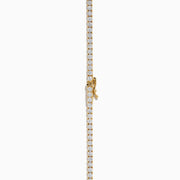 The Lab Grown Diamond 9.8ct Tennis Necklace in 14K Yellow Gold features a single row of round lab grown diamonds set closely together in an elegant line, shown on a plain white background.