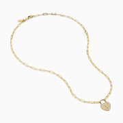 The Novelty 14K Yellow Gold Diamond Heart Lock Pendant is a yellow gold chain necklace with a diamond heart padlock, adorned with sparkling stones and a central keyhole design.