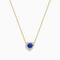 The Nahla 14K Yellow Gold Heart Tanzanite and Diamond Necklace features a heart-shaped blue tanzanite pendant accented with sparkling diamonds.