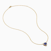The Nahla 14K Yellow Gold Heart Tanzanite and Diamond Necklace features a heart-shaped blue tanzanite pendant accented with sparkling diamonds.