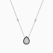 The Pave Classica 14K White Gold Diamond and Enamel Necklace features a teardrop diamond pendant bordered with black enamel and two small round diamonds on the chain, set against a white background.