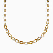 The 14K Yellow Gold Chain Link Necklace with Diamond Accents features oval links joined by sections set with clear diamonds, forming a symmetrical, elegant design.