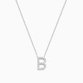 The 14K White Gold Diamond Initial B Pendant is displayed against a plain white background, featuring a delicate design with sparkling diamonds.
