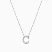 The 14 Karat White Gold Initial C Diamond Necklace features a pendant set with sparkling diamonds on a sleek white gold chain, shown against a plain white background.