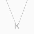 A 14 Karat White Gold Initial K Diamond Necklace featuring a sparkling diamond-encrusted K pendant on a delicate chain.