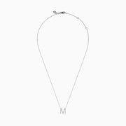 The 14K White Gold Diamond Initial M Pendant features a delicate white gold chain and a sparkling diamond-studded M pendant, displayed against a plain white background.