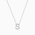 The 14 Karat White Gold Initial S Diamond Necklace features a sparkling S-shaped pendant accented with diamonds—a subtle yet stunning piece for everyday elegance.