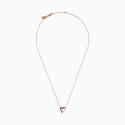 The 14K Rose Gold Pink Sapphire Open Heart Necklace features a delicate heart design, half adorned with sparkling pink sapphires, hanging gracefully from a fine chain for a romantic touch.