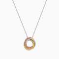 The 18K Tri-Color Gold Natural Yellow, Pink and White Diamond Circle Necklace showcases a round pendant with three rows of diamonds in pink, yellow, and white, displayed on a delicate silver chain against a white background.