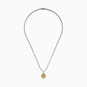 The 18K Two-Tone Gold Yellow and White Diamond Double Halo Necklace features a teardrop-shaped yellow gemstone pendant with a double halo of diamonds, hanging from a white diamond-set chain.
