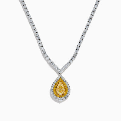 The 18K Two-Tone Gold Yellow and White Diamond Double Halo Necklace features a teardrop-shaped yellow gemstone pendant with a double halo of diamonds, hanging from a white diamond-set chain.