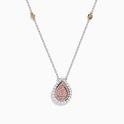 The 18K Two-Tone Gold Pink and White Diamond Pear Halo Pendant features sparkling pink and white diamonds on a two-tone gold design, creating an elegant halo look.