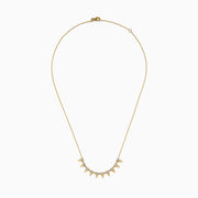 The 14K Yellow Gold Diamond Spike Collarbone Necklace features alternating clear diamonds and gold spike accents on a delicate gold chain.