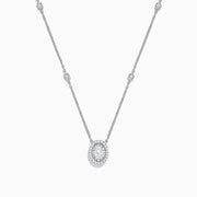 The Pave Classica 14K White Gold Diamond Oval Necklace features an oval pendant encrusted with diamonds and extra sparkling stones spaced along the chain, creating a delicate and elegant look.