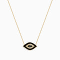 The Novelty 14K Yellow Gold Black Enamel and White Diamond Evil Eye Necklace features a pendant with a black enamel center, a bold black outline, and a ring of sparkling white diamonds.