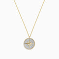 The Novelty 14k Yellow Gold Diamond Compass Pendant features a round star design on a textured silver-tone background, accented with a beaded gold border, and displayed on a plain white background.