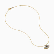 The Espresso 14K Yellow Gold Diamond Evil Eye Pendant features black and white diamonds in an eye-shaped design, creating a sparkling and stylish necklace.