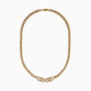 The Signature 14K Yellow Gold Diamond and Emerald Panther Necklace features two jeweled panther head clasps with green gemstone eyes and pavé diamond accents, facing each other at the center.