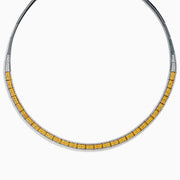 The Canare 14K Two Tone Gold White and Yellow Diamond Necklace features a row of square yellow diamonds set in a band, bordered by white diamonds—forming a sleek partial collar with an open top.