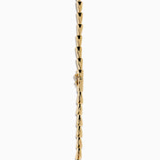 The Signature 14K Yellow Gold Diamond and Tsavorite Panther Necklace features angular links and two detailed panther head motifs with tsavorite eyes and diamond accents at the center, facing each other to form the clasp.