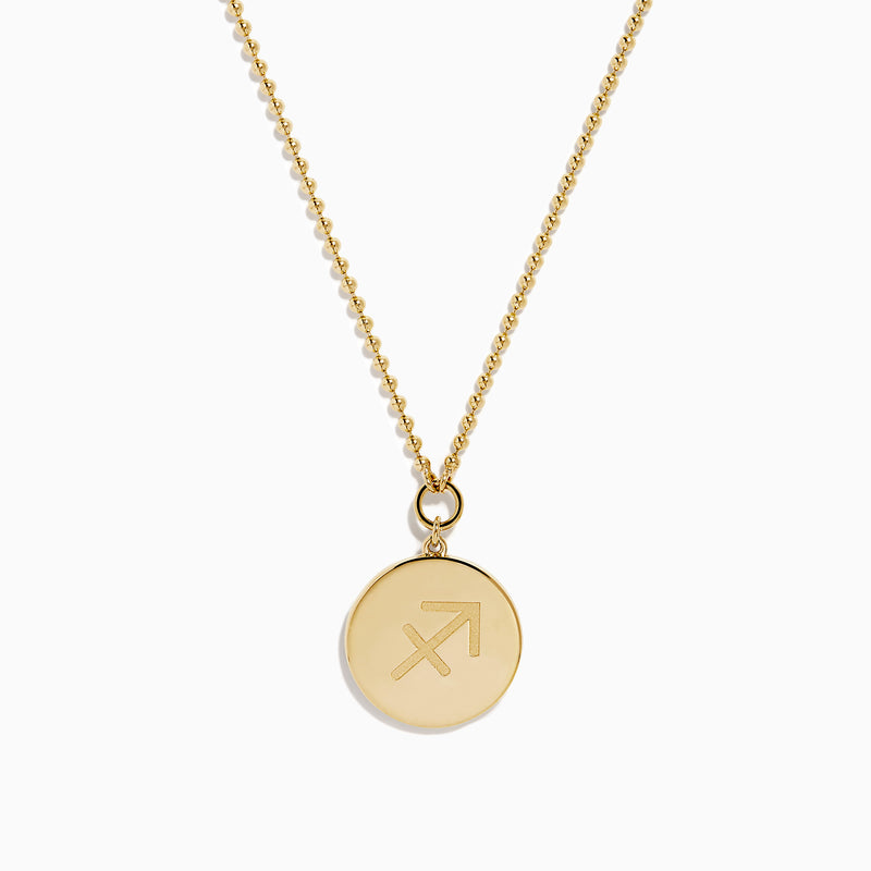 The Zodiac 14K Yellow Gold and Diamond Sagittarius Necklace features a round unicorn pendant with diamond accents on the edge, hanging from a simple gold chain—perfect as a unique zodiac necklace for everyday wear.