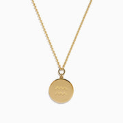 Zodiac 14K Yellow Gold and Diamond Aquarius Necklace with a round pendant engraved with a woman, bordered by diamond-like stones, on a delicate 14K gold chain. Shown on a white background.