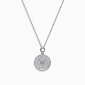 The Zodiac 925 Sterling Silver and Diamond Scorpio Necklace features a round, textured pendant with an engraved scorpion design, hanging from a beaded chain against a white background.