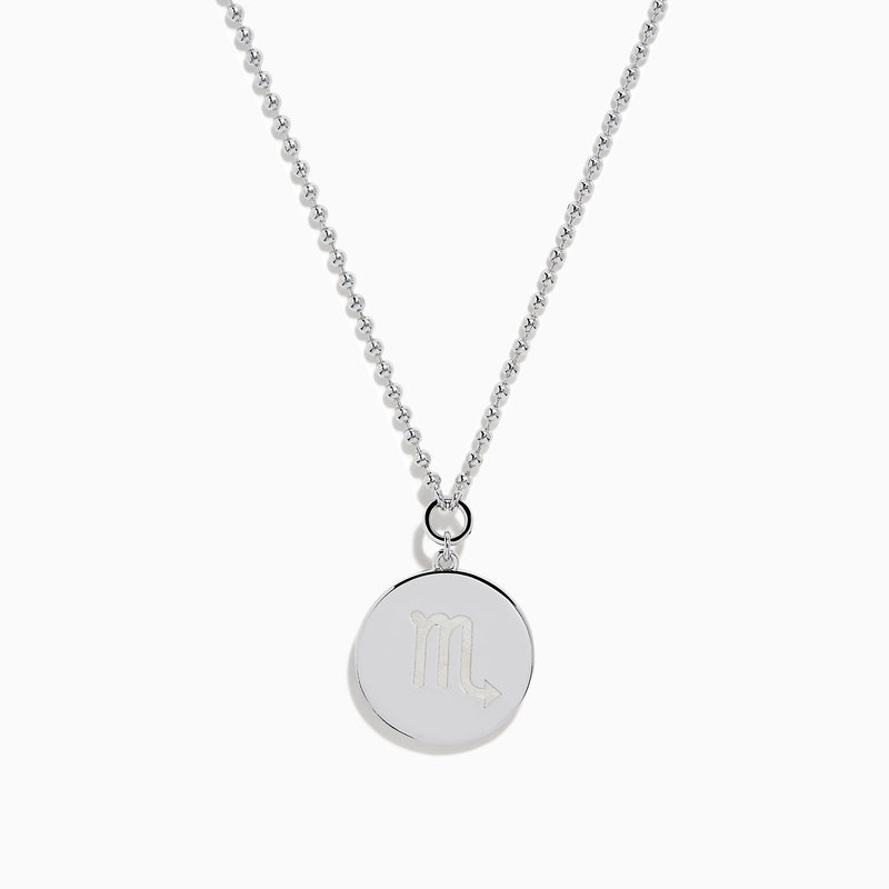 The Zodiac 925 Sterling Silver and Diamond Scorpio Necklace features a round, textured pendant with an engraved scorpion design, hanging from a beaded chain against a white background.