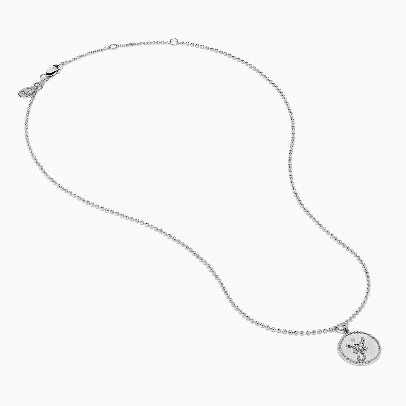 The Zodiac 925 Sterling Silver and Diamond Scorpio Necklace features a round, textured pendant with an engraved scorpion design, hanging from a beaded chain against a white background.