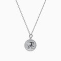 The Zodiac 925 Sterling Silver and Diamond Capricorn Necklace features a round, textured pendant engraved with a figure playing soccer, offering a unique twist on the classic Zodiac style. Shown against a plain white background.