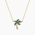 The 14K Yellow Gold Tsavorite and Diamond Palm Tree Pendant features green tsavorite and diamond accents on a simple gold chain, shown on a white background.