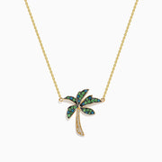 The 14K Yellow Gold Tsavorite and Diamond Palm Tree Pendant features green tsavorite and diamond accents on a simple gold chain, shown on a white background.