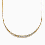 The 14K Yellow Gold Diamond Graduating Collar Necklace features a stunning curved design with alternating rectangular diamond segments and polished gold, showcased elegantly on a white background.