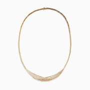 The Doro 14K Yellow Gold Diamond Statement Collar Necklace 2.75 TCW showcases an elegant, layered design with rows of sparkling diamonds on yellow gold, forming a gentle center curve for a luxurious look.
