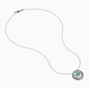 The Lab Grown Blue and White Diamond Circle Pendant in 14K White Gold features a circular pendant with clear and blue stones, displayed on a plain white background.