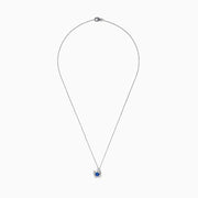 The 925 Silver Tanzanite and Diamond Crab Pendant features a round blue tanzanite gemstone at the center and small clear stones accenting the crab’s claws.