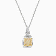 The 14K Two Tone Gold White and Yellow Diamond Cluster Pendant features a square of yellow gemstones framed by white gemstones on a delicate chain.