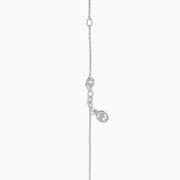 The 14K Two Tone Gold White and Yellow Diamond Cluster Pendant features a square of yellow gemstones framed by white gemstones on a delicate chain.