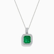 The Brasilica 14K White Gold Emerald and Diamond Pendant is a silver necklace with a square emerald and diamond on a delicate white gold chain, shown against a white background.