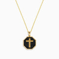 The 14K Yellow Gold Black Diamond Cross Pendant features an octagonal black diamond cross set in 14K yellow gold, shown against a white background.