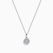 The Pave Classica 14K White Gold Diamond Halo Pendant (0.49 TCW) features a round center diamond with a sparkling halo, suspended from a delicate white gold chain. Displayed on a plain background, this piece reflects timeless elegance.