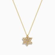 The Doro 14K Yellow Gold Diamond Star of David Pendant features a geometric design with sparkling diamonds along its lines, shown against a white background for an elegant and timeless look.