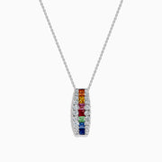 The Watercolors 14K White Gold Multi Sapphire and Diamond Bar Pendant showcases vibrant sapphires set in a vertical bar, accented by sparkling diamonds.