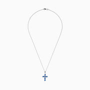 The Royal Bleu 14K White Gold Blue Sapphire Cross Pendant features six oval blue sapphires separated by small clear stones, set on a silver chain and displayed against a white background.