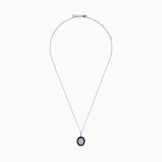 The Royal Bleu 14K White Gold Sapphire and Diamond Pendant features an oval diamond cluster surrounded by sapphires and an outer row of sparkling diamonds.