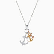 The Seaside 14K 3 Color Gold Diamond 3 Anchor Pendant showcases three anchor charms—one adorned with diamonds—crafted in tri-color gold, all suspended together in an elegant design.