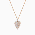 The Pave Rose 14K Rose Gold Diamond Heart Pendant features a heart-shaped pendant outlined in rose gold, encrusted with closely set sparkling diamonds for a brilliant, eye-catching finish.