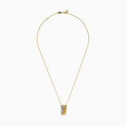The 14K Two Tone Gold Yellow and White Diamond Pave Crossover Pendant features intertwined yellow and white gold bands, both encrusted with sparkling diamonds, suspended from a classic gold chain necklace.