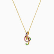 The Novelty 14K Yellow Gold Multi Sapphire Tsavorite Treble Clef Pendant is showcased on a plain white background.